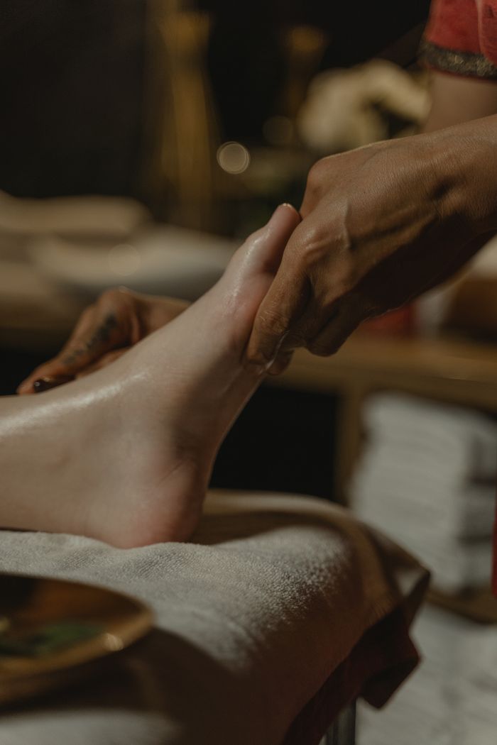 Crafting Captivating Headlines: Your awesome post title goes here Close-up of a soothing foot massage in a tranquil spa environment, promoting relaxation and wellness.
